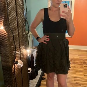 This dress is about 10 years old but only worn a couple times. Forest green